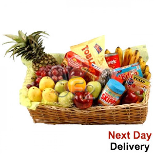 Deliver best wishes to them with a bounty of gourmet food and fruits. This basket packed with a mouth-watering array of seasonal fruits, cheese, pasta, canned goods, chocolates and sausages is sure to be a welcome gift. #food