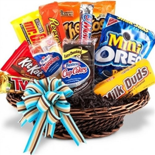 A gift basket that is as fun as it is delicious! Filled with delicious snacks and sweets, our popular Junk Food Basket is the perfect gift for students, employees, or anyone who deserves an extra special indulgence. An experienced, local florist will fill #food
