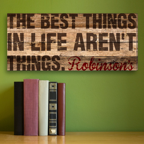 This is an elegant canvas sign that features a thought provoking text in a beautiful script. It features the famous thought Best things in life aren't always things The text is highlighted on a wooden canvas background. Best things in life aren't alway #best