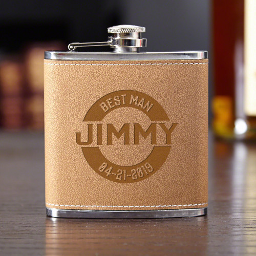 A flask is a classic gift for any member of your wedding party. Give them a chance to enjoy their favorite liquor while everyone else is waiting in line for the open bar. This personalized best man flask is crafted from stainless-steel wrapped in cocoa le #best