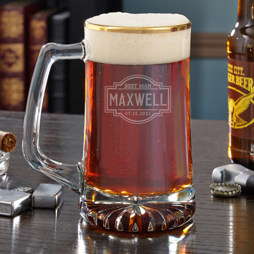 We bet you didnâ€™t think a beer mug could be this sophisticated. This handsome personalized beer mug has a 22k gold rim, a beautiful starburst base, and a cool engraved design. Featuring a title, name, and date of your choosing, this mug is meant to comm #mug
