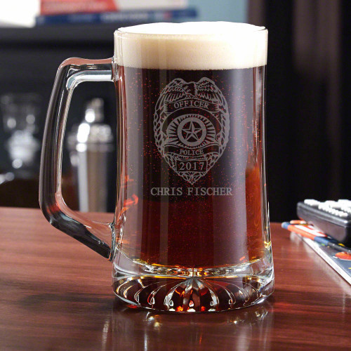 Give some authority to your home bar glassware collection with our Police Badge personalized beer mug. Heavy duty and right down to business, this mug is perfect for enjoying a nice brew after a long day on the job. Engraved with a traditional police badg #mug