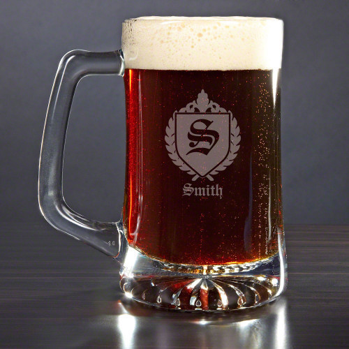 Add some class to your bar glassware collection with our Oxford personalized beer mug. Featuring our handsome shield emblem design, this mug comes customized with the initial and last name of your choice, making it a great gift for any special occasion. M #mug