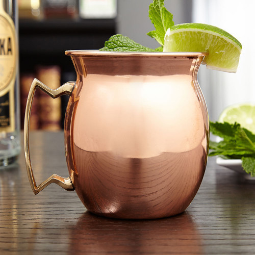 Drink a toast to the classic cocktail in this sleek Moscow Mule mug. Made in the decades-old tradition of copper drinking mugs, these Moscow Mule cups feature a rounded design, with a flared lip and sturdy geometric handle. Made of solid copper, this Mosc #mug