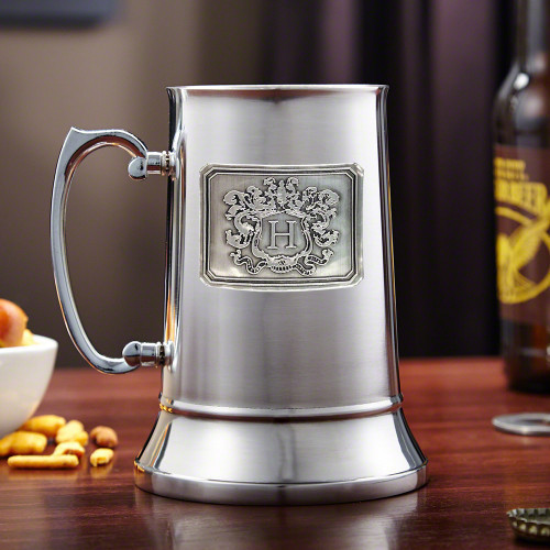 Sharp sophistication with a gallant touch, this personalized beer mug is the perfect way to enjoy cold beer and beverages. The classic stein shape is enhanced with a sculpted handle and sleek, shiny finish, reminiscent of polished gunmetal. Crafted from s #mug