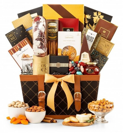 A true treasure trove of our finest gourmet foods! A true treasure trove of our finest gourmet foods! Surprise a loved one with this elegant gift chest all dressed in gold! Full of gourmet sweets and treats, this gift basket proves the perfect choice for #gift