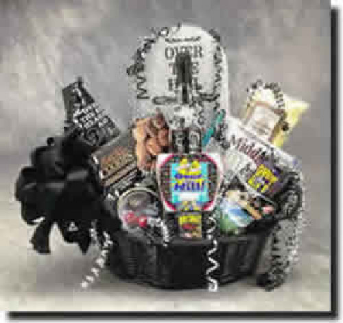 That over-the-hill birthday will be lots of fun when the Over The Hill gift basket arrives. A tombstone towers over cookies, over the hill pills, an over the hill mug, lots of goodies as well as the Victims Guide to Birthdays book. Don't miss the over the #gift