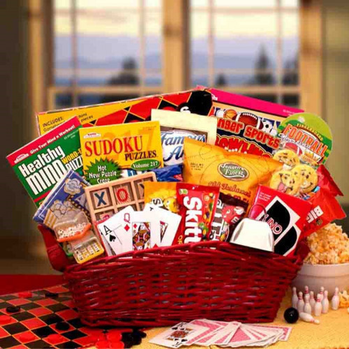 A basket filled with great games and sweet snacks for the entire family. Fun times here we come! Send this fun filled and sweet treats gift basket to someone special today. A unique gift appropriate for many occasions we've included an assortment of fun a #gift
