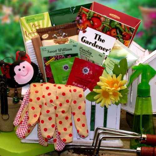 Garden planter loaded with seeds, tools, and gourmet treats: Have a wonderful gardener in your life? Send them this adorable garden planter filled with gardening treats and tools. We've included garden seeds, a mini wind chime, a gardening knee pad and mo #gift