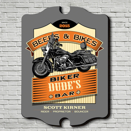 Keep your bar rough and tough with our personalized biker bar sign. Showing off a classic motorcycle offset by a distressed background bordered in a daring black this wooden sign is the perfect gift for that motorcyclist in your life. This personalized si #bar