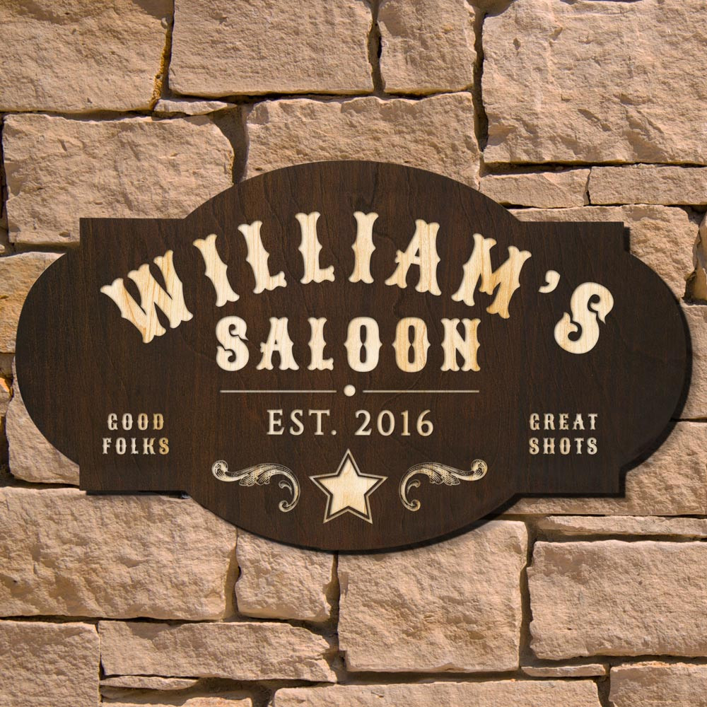 Saddle on up to this authentic-looking Wild West Saloon custom bar sign. Not even an outlaw sheriff will be able to deny the ramblin' beauty of these bar signs for home. Made from thick birch wood, each saloon sign is cut with sharp-shootin' precious, st #bar