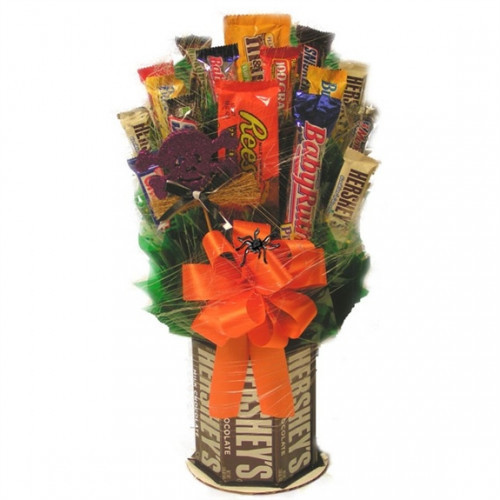 A Candy Bouquet Decorated for Trick or Treaters. This gift starts with our Hershey's and More Candy Bouquet. Then we use Orange or Black bows and a Halloween themed pick.To top it off we add spider webs. The candies assortments include Baby Ruth, Reeses, #bar