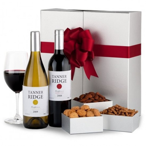 An elegant offering of fine wine & food is sure to make any occasion memorable. Included is a bottle of Sycamore Lane California Cabernet Sauvignon & Chardonnay with an array of delicious finger foods, shipped in a one-of-a-kind wine box. #gift