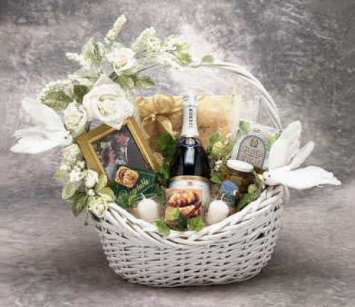 It's Wedding Gift Time! Here we have a real Top Shelve Wedding Gift! Our white wedding gift basket is loaded to the hilt with fantastic Gourmet treats. Let the two Lovers know how much you care about their sacred joining. This gift is sure to please them #gift