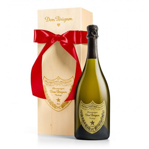 Even if you have to make up a special occasion just to celebrate, enjoy a bottle of this fine champagne. The celebratory experience begins with a metallic-accented wine box that opens to reveal a bottle of 2002 Dom Perignon Champagne and two glass flutes. #gift