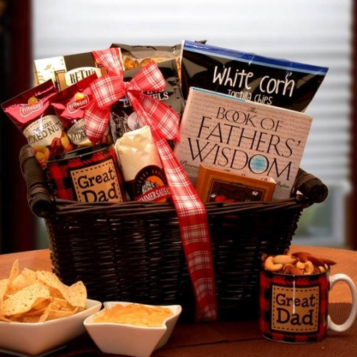 This basket starts with a Book of Father's Wisdom and He's A Great Dad Coffee Mug. It is loaded with sausage, cheese, snacks and sweet treats. #gift