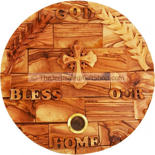 Beautifully hand made wall plaque 'God Bless Our Home' with carved cross from high quality Olive Wood. Size: 8 inches / 19 cm approx diameter.Made in Bethlehem Features branches of the palm tree on the edges and a sample of soil from the Holy Land Ready t #home 