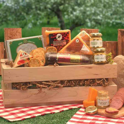 This unique pine crate is filled with savory cheeses, sausage, crackers and more. A delicious gesture in gourmet gift giving. A unique way to show you care or send your sincere sentiments. Signature Sausage and Cheese Crate Contents: Wooden Crate Swis #gift