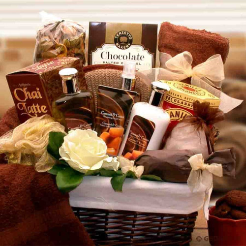 A spa gift that features full size bottles of Caramel and Cream body potions.This luxurious spa basket is a gift that surrounds the body in an intoxicating essence that is exotic, delicate, and thoroughly romantic. Creamy caramel and soothing cream infuse #gift