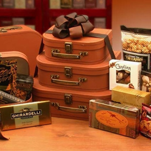 A great gift for your favorite traveler! The 3 faux-leather suitcases allow your loved ones to take their treats with them - plus they can be used long after the goodies are gone! Contents Include: 3 pc Faux Leather Suitcases, Tomato Basil Crackers, Cocoa #gift