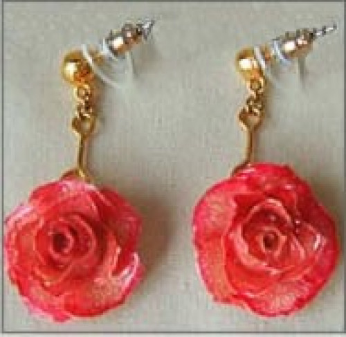 Miniature Pink Wild roses have been preserved in a clear lacquer finish and trimmed in gold. Rose earrings make great jewelry gifts. Check out our gold rose jewelry line for more unique gift ideas. #gift