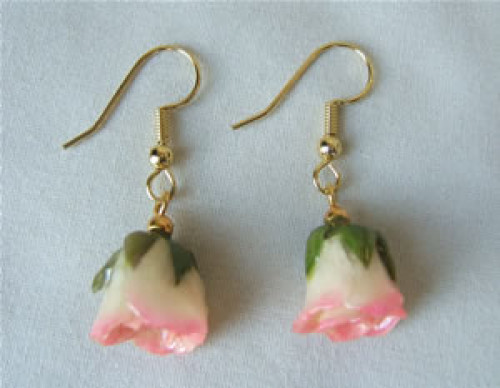 You're Sure To Dazzle Her with This Real Rose Jewelry! These genuine cream to pink mini rose earrings will enhance her beauty. The miniature cream and pink roses have been hand preserved in a clear lacquer finish to allow them to be everlasting. They are #gift