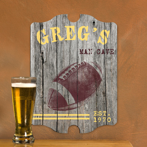 Win big when you give your favorite guy this fun pub sign! A football fanatic will cheer for this vintage Football pub sign. The sign will lend his favorite space the charm of an old fashioned sports pub with a weathered wood background and football image #vintage