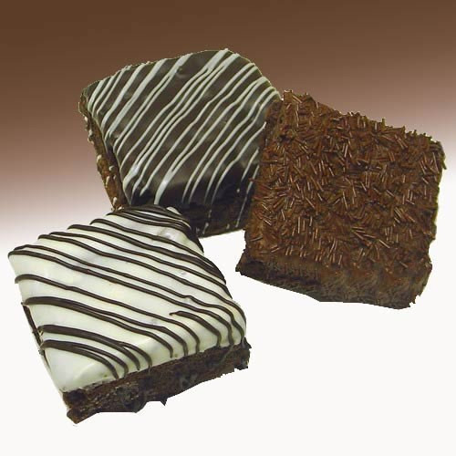 These Triple Chocolate Brownies are made with 3 times the normal amount of chocolate, filled with Belgian Chocolate Chunks, hand-dipped on top with a coat of Belgian Chocolate and finished with chocolate decor. Included in this tasty gift assortment are 1 #gift