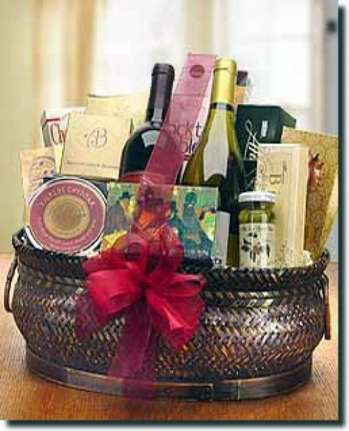 Two bottles of select wines from award winning vineyards are the focus of this basket. Other varieties are available including two whites or a combination of the two or one bottle of champagne. A variety of gourmet foods are included in the basket to enha #gift