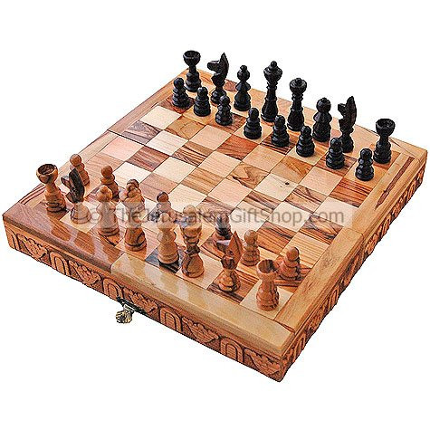 Olive Wood Chess board with real olive wood pieces - also a great conversation piece! Hand made in Bethlehem. Board size open: 9.5 x 9.5 x 1.7 inches. Pieces store inside board for easy storage. Unique gift from the Holy Land. Shipped direct from the Holy #gift