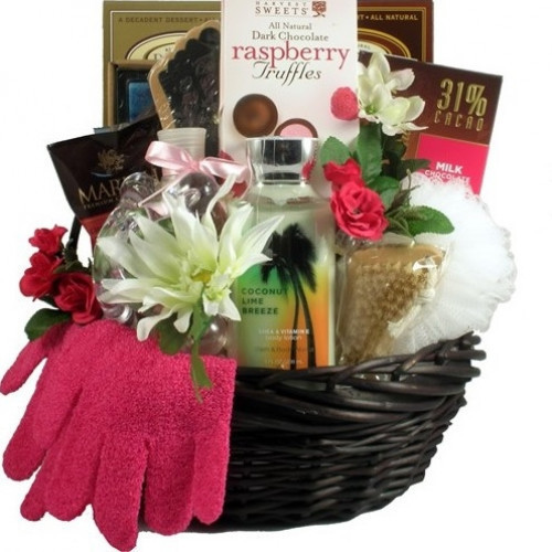 This lovely gift basket overflows with relaxing spa products and delectable chocolates. A perfect gift for Mother's Day or Valentine's Day! #gift