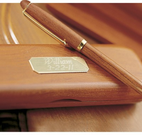 A lovely gift for any graduate or executive! This genuine Rosewood Pen and Case offers style to any executive's office. This pen gift set can also be given as a personalized gift for graduation or birthday gift. Brass plate is personalized with up to two #gift