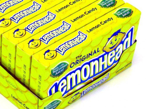Lemonheads are small panned candies with an tart lemon flavor, one of the first sour candies made. Orders placed by midnight usually ship on the next business day. #candy