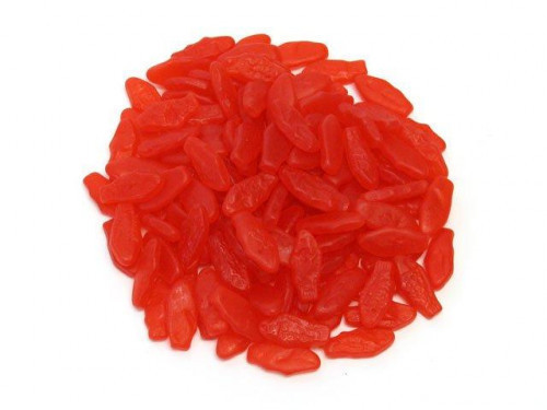 Swedish Fish are soft and chewy fish-shaped candies that come in assorted flavors. These fish are a little smaller than the regular size, measuring 1 1/8 inches long. The regular size fish is 2 inches long. Bulk candy counts are approximated. Orders place #candy