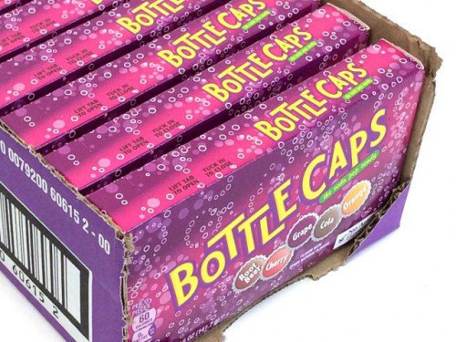 Bottle Caps are tart candies made to look like metal soda bottle caps. Each package has assorted soda flavors which are orange, cola, cherry, grape and root beer. Orders placed by midnight usually ship on the next business day. #candy