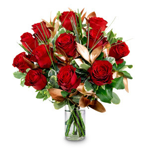 A burning passion of desire explodes through this exquisite collection of premium one dozen red roses accented with foliage and bear grass, elegantly arranged with romantic copper ruscus. Complimentary Luxury Valley Truffles from Flora2000! #luxury