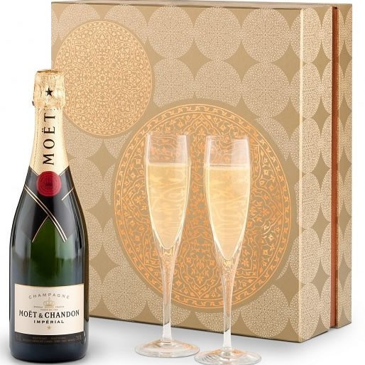A gift that exceeds expectations in presentation and quality, this exquisite gift set is the only way to send a bottle of upscale champagne. The unique experience begins with a metallic-accented wine box that opens to reveal a bottle of Veuve Clicquot Bru #luxury