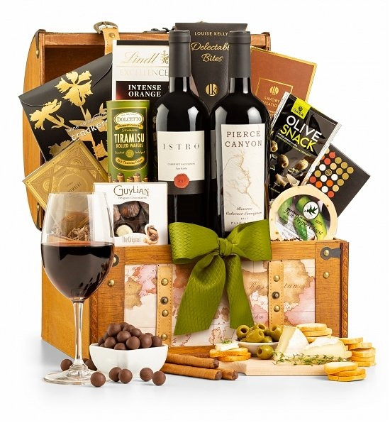 This unique variety of world-class food & wine is an impressive gift. A stylish travel trunk showcases two exceptional wines, Beringer Chardonnay & Antinori Santa Cristina, accompanied by international gourmet favorites. #luxury