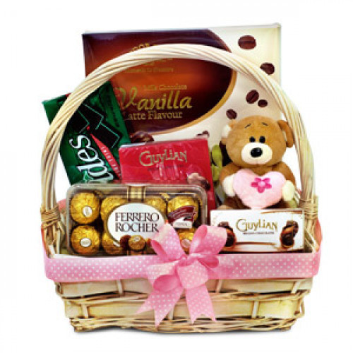 If nothing works, try chocolates. But make sure they're Guylian Classics. Keep the celebrations going with this extravagant Chocolate Gift Basket consisting Tudor Gold Chocolate, Andes Creme de Menthe Thins, Guylian Praline, Guylian Mini Chocolates, Ferre #gift