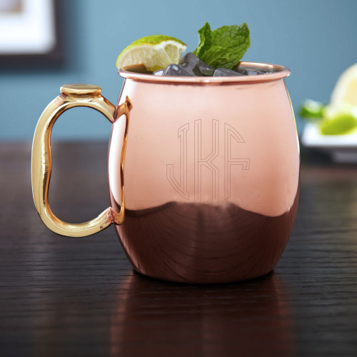 Give your limes, ginger, and vodka a worthy home with our Circle Monogram Moscow Mule Mug. Copper plated, and lined with a stainless steel interior, this copper mug is not only handsome but can hold a generous 20 ounces. Featuring our circle monogram desi #%20